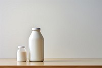 Milk bottle table dairy. AI generated Image by rawpixel.
