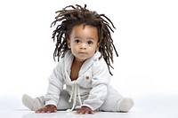 Black baby dreadlocks portrait crawling. 