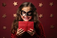 Christmas costume holding gift. AI generated Image by rawpixel.