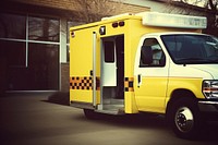 Ambulance in front of hospital ambulance vehicle van.