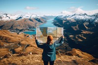 Man holding a map landscape mountain outdoors. AI generated Image by rawpixel.