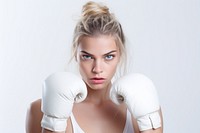 Woman practicing boxing punching portrait sports. AI generated Image by rawpixel.