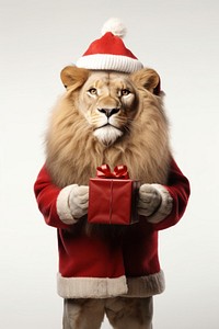 Lion holding Christmas gift. AI generated Image by rawpixel.