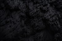 Black fluffy texture backgrounds monochrome material. AI generated Image by rawpixel.