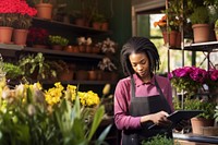 Black female florist plant working flower. AI generated Image by rawpixel.