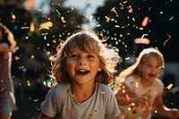 Party confetti outdoors child. AI generated Image by rawpixel.