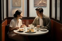 Hongkong couple restaurant coffee table. AI generated Image by rawpixel.