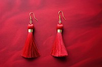 Red Tassel Earrings earring jewelry red. AI generated Image by rawpixel.
