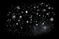 Photo of a *falling snow falls* dense, snow flakes, isolated on blue background --ar 3:2