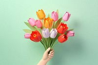 Tulips holding flower plant. AI generated Image by rawpixel.