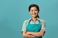 Asian mother wearing apron smiling adult smile. AI generated Image by rawpixel.