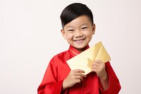 Happy Asian boy portrait holding smile. AI generated Image by rawpixel.