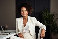 Business woman sitting portrait office. AI generated Image by rawpixel.