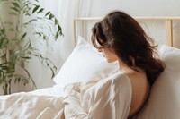Woman sleeping blanket adult. AI generated Image by rawpixel.