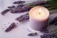Lavender candle lighting flower plant. AI generated Image by rawpixel.