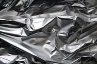 Aluminum foil texture backgrounds monochrome aluminium. AI generated Image by rawpixel.
