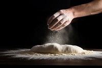 Sprinkling dough flour hand. AI generated Image by rawpixel.