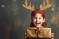 Christmas child gift girl. AI generated Image by rawpixel.