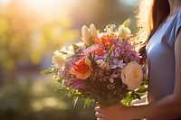Flower bouquet blossom holding plant. AI generated Image by rawpixel.