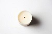 A christmas candle white background simplicity lighting. AI generated Image by rawpixel.