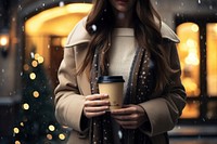 Paper cup holding jacket winter. AI generated Image by rawpixel.