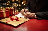 Writing christmas paper table. AI generated Image by rawpixel.