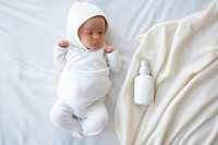 White lotion package baby portrait newborn. AI generated Image by rawpixel.