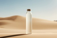 Bottle product nature sand day. AI generated Image by rawpixel.