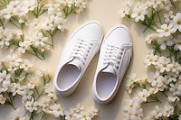 White sneakers product flower footwear plant. AI generated Image by rawpixel.