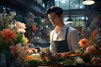 Man florist working flower concentration. AI generated Image by rawpixel.