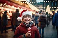 A kid having a christmas ice-cream photography portrait street. AI generated Image by rawpixel.