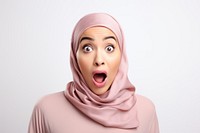 Muslim woman surprised white background gesturing headscarf. AI generated Image by rawpixel.