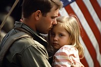 Patriotic serviceman embracing his child military portrait adult. 