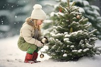 Decorating chirstmas tree christmas outdoors winter. AI generated Image by rawpixel.