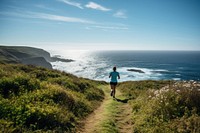 Woman trail running outdoors walking nature. AI generated Image by rawpixel.