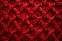 Knitted sweater textile red backgrounds. 