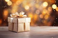 Christmas present box gift gold illuminated. AI generated Image by rawpixel.