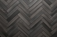 Dark grey herring bone parquet wood backgrounds flooring. 