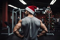 Handsome fitness man gym christmas sports. AI generated Image by rawpixel.