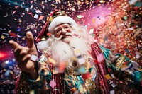 Santa Claus enjoying a festive Christmas party christmas confetti festival. AI generated Image by rawpixel.