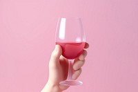 Hand holding a wine glass drink refreshment celebration. AI generated Image by rawpixel.