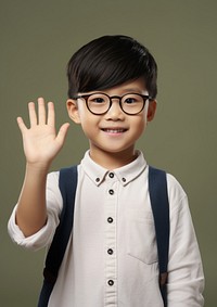 Asian todler boy portrait glasses smile. AI generated Image by rawpixel.