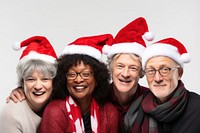 Mature adults wearing Christmas hat christmas laughing togetherness. AI generated Image by rawpixel.