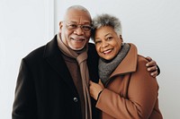 Happy black senior couple wearing a winter jacket laughing portrait scarf. AI generated Image by rawpixel.