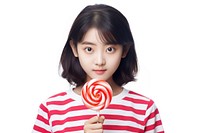 Girl holds lolipop lollipop candy food. AI generated Image by rawpixel.