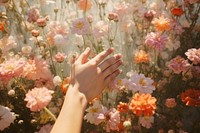 Women hand touching a flowers outdoors nature finger. AI generated Image by rawpixel.