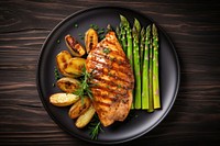 Grilled chicken plate asparagus seafood. AI generated Image by rawpixel.