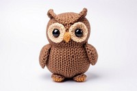 Knitted cute toy owl white background representation. AI generated Image by rawpixel.