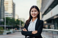 Thai business woman outdoors adult smile. AI generated Image by rawpixel.