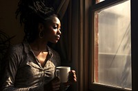 Black woman window coffee portrait. AI generated Image by rawpixel.